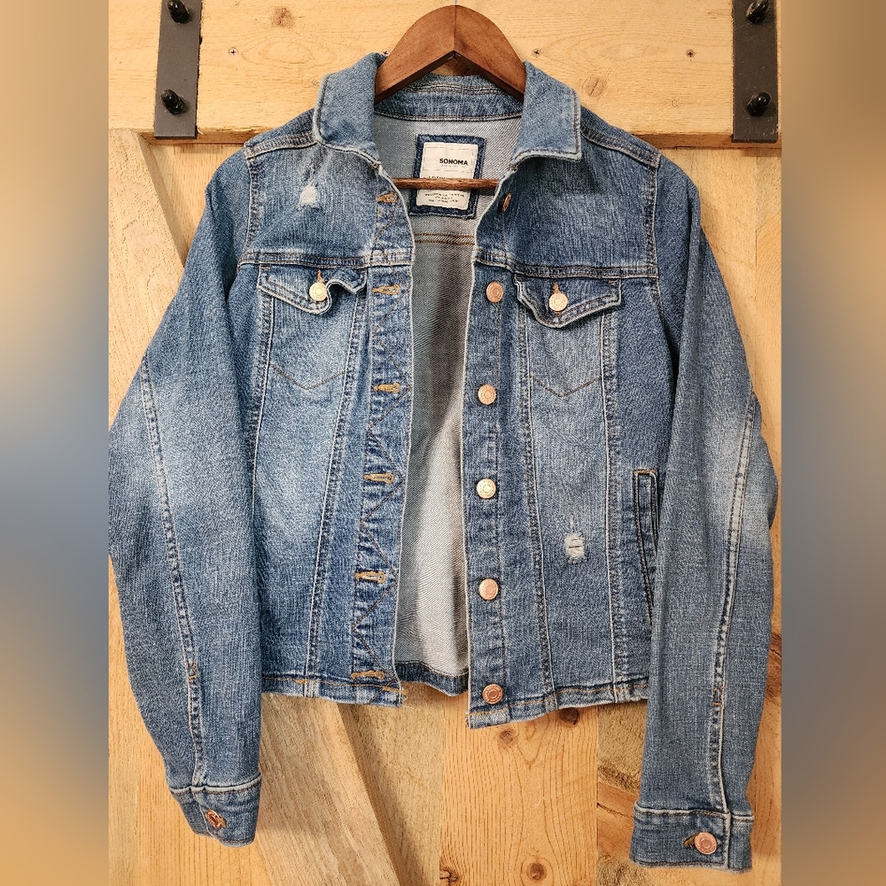 Distressed jean jacket